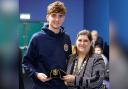 Owen Doyle is presented with Scotland cap by Gillian Duffy