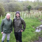 Councillor Michael McCormick with senior forester Ned Rundell