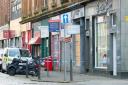 The alleged attack happened at a barber shop on West Blackhall Street