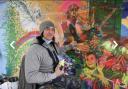 ARTIST JIM STRACHAN AT IRH WITH HIS MURAL