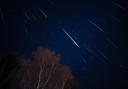 The Draconids meteor shower takes place annually and is caused by comet debris burning up in the atmosphere.