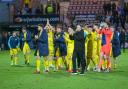 Morton players celebrate 5-0 win over Dunfermline