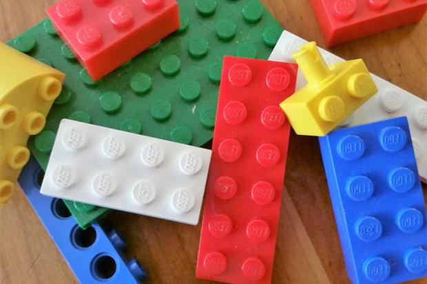 Greenock Telegraph: Multi-coloured LEGO blocks. Credit: Canva