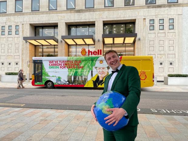 Greenock Telegraph: Joe Lycett outside of Shell's Headquarters in London, perfoming a stunt as part of his documentary Joe Lycett vs The Oil Giant, which explores the energy company, its marketing and its exploration for new oil reserves. Photo via PA.