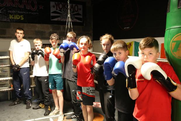 Inverclyde Boxing Club success. Left to right: Jordan Hayter, Conor Jordan, Jonah Waddell, Dylan O'Donnell. Noah Waddell, Abbigael Crawford, Logan McEwan, Robbie McMaster.