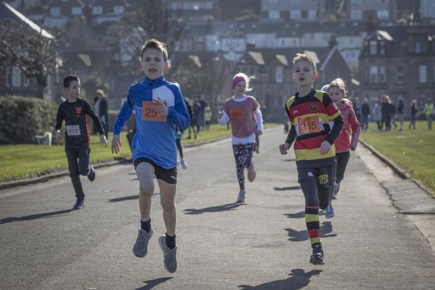Scottish Athletics Young Athletes Road Race Championships at Battery Park, Greenock Hosted by Inverclyde Athletics Club 20th March 2022. Here the Inverclyde Athletics Club young runner is taking part in the Inverclyde Athletics club own Junior races that