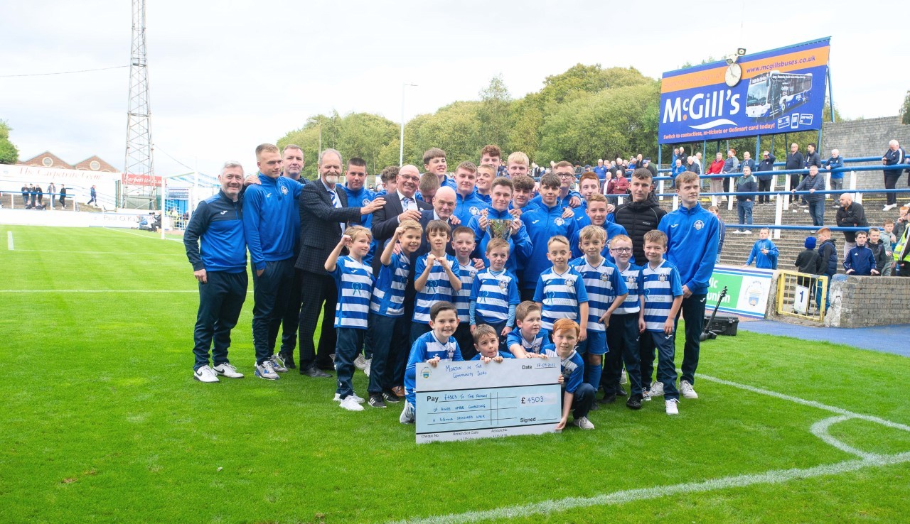 Morton in the Community 2007s take trophy on lap of honour