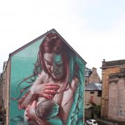 mermaid breastfeeding mural