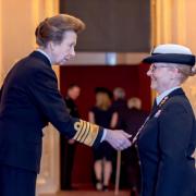 Chief Petty Officer Miriam Charlton receiving her MBE from Princess Anne at Windsor Castle