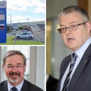 Stuart McMillan MSP, right, and Ronnie Cowan MP have called for government action on excessive fuel prices