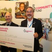 National Lottery Scotland Director Neil Ritch with Ronnie Cowan MP.