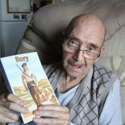 Bill McNeice with his first book, Rory