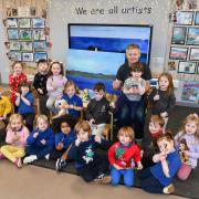 Youngsters at Moorfoot Nursery help artist Kevin Hunter create an artwork inspired by Gourock landscape