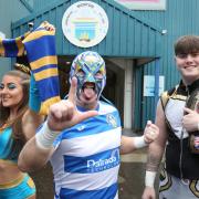 Lucha DS in his Morton FC wrestling mask pictured with wrestlers Angel Hayze and Logan Smith