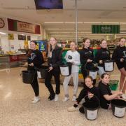 Dancers from JD Dance raised £800 packing bags in Morrisons in Greenock