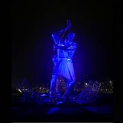 Shipbuilders of Port Glasgow statue lit up blue for International ME Awareness Day.