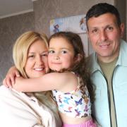 Little six year old Naomi Rankin, her dad Neil and mum Emma McCaig