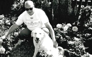 John Craynor, pictured here at home in 1999, was a keen gardener and a prolific fundraiser