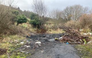 Police have recovered a fire-damaged vehicle from wasteland in Greenock’s east end just days after they appealed for information about a car involved in a recent murder.